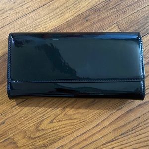 Black patent leather ALDO clutch